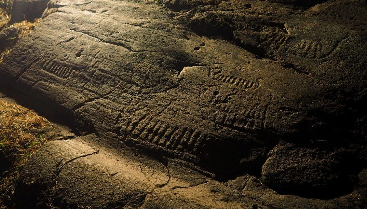 Bronze age petroglyphs ancient rock carvings landscape Norway ocean
