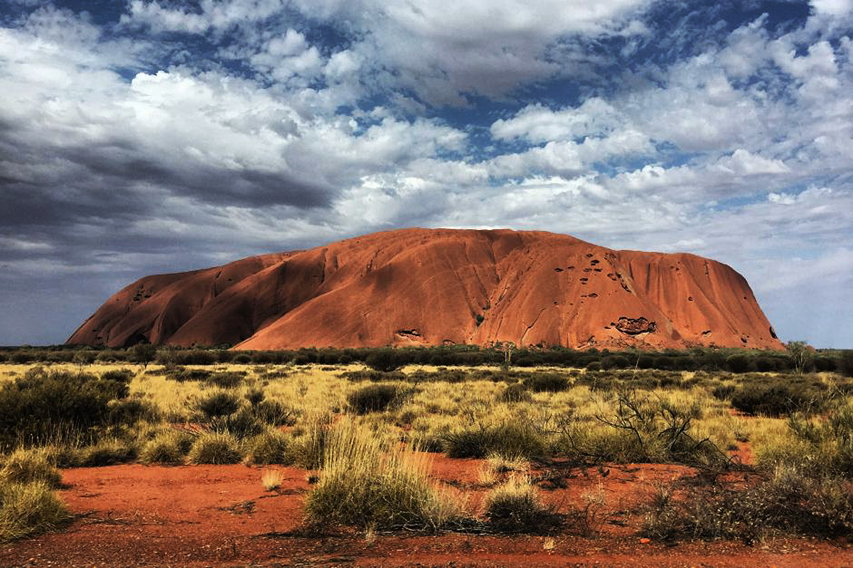 Australia traditional owners aghast Uluru cave painting vandalised vegetable oil national park visitor tourism manager