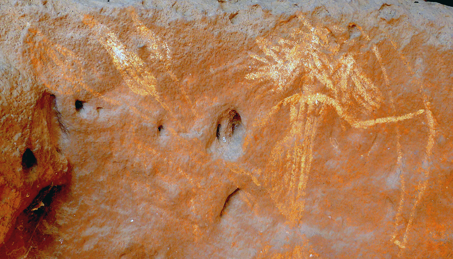 Women Hunters in Indian Rock Art A pregnant woman is shown with a bow and three arrows with big arrowheads, her swollen belly indicates her pregnancy.