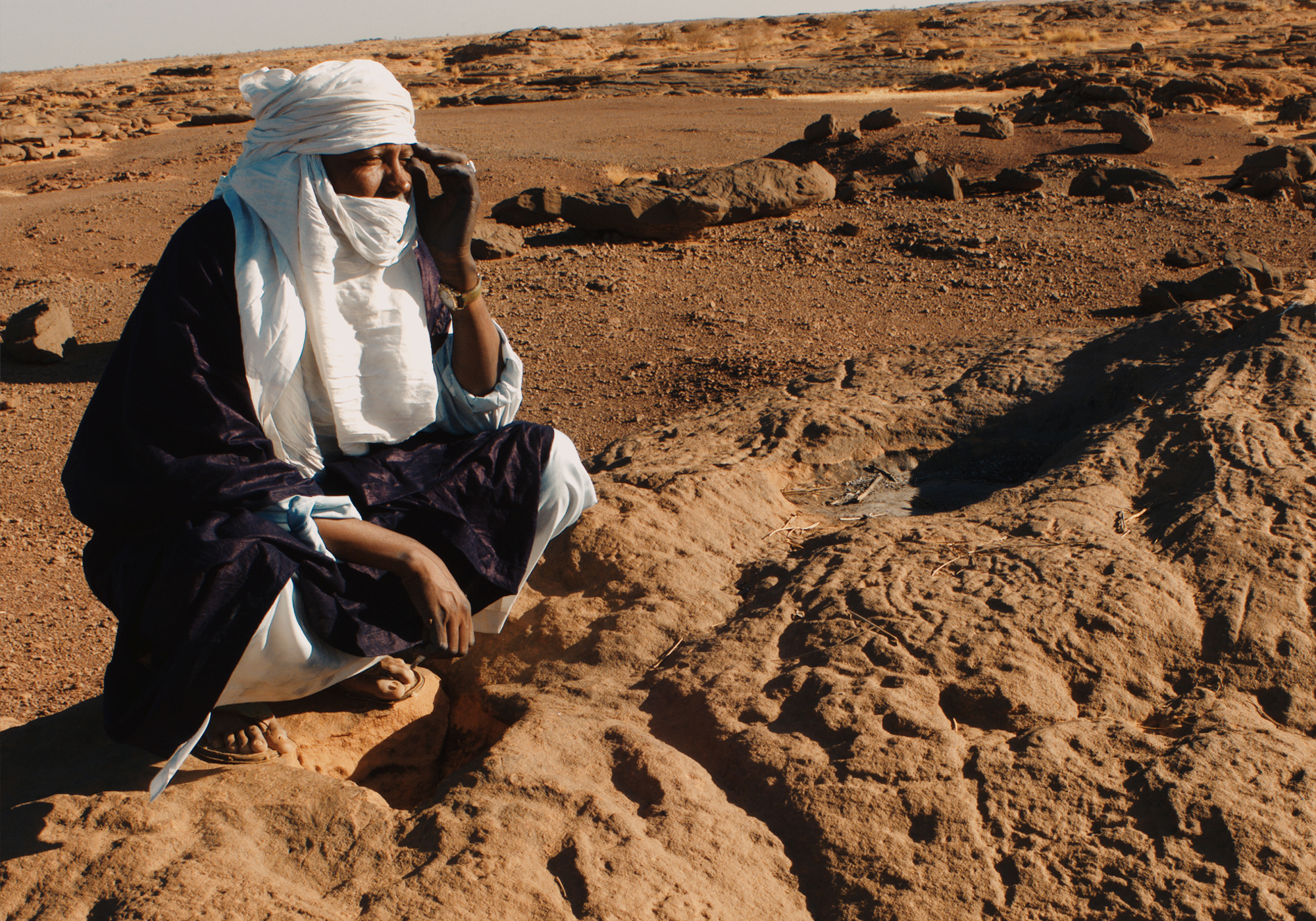 Tuareg guide at a rock art site Niger Africa