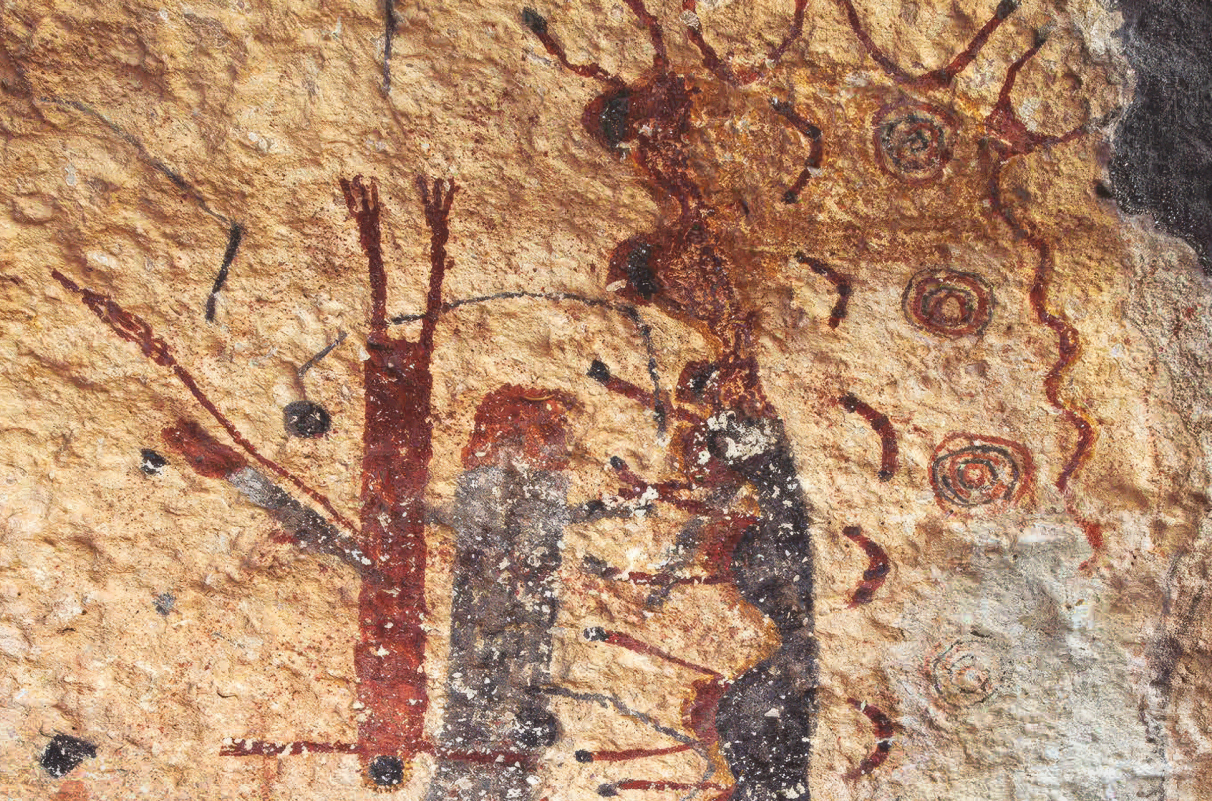 Sometimes artists painted upside down figures. In the story told through the White Shaman Mural, this black-masked anthropomorph is the Evening Star descending into the underworld at sunset
