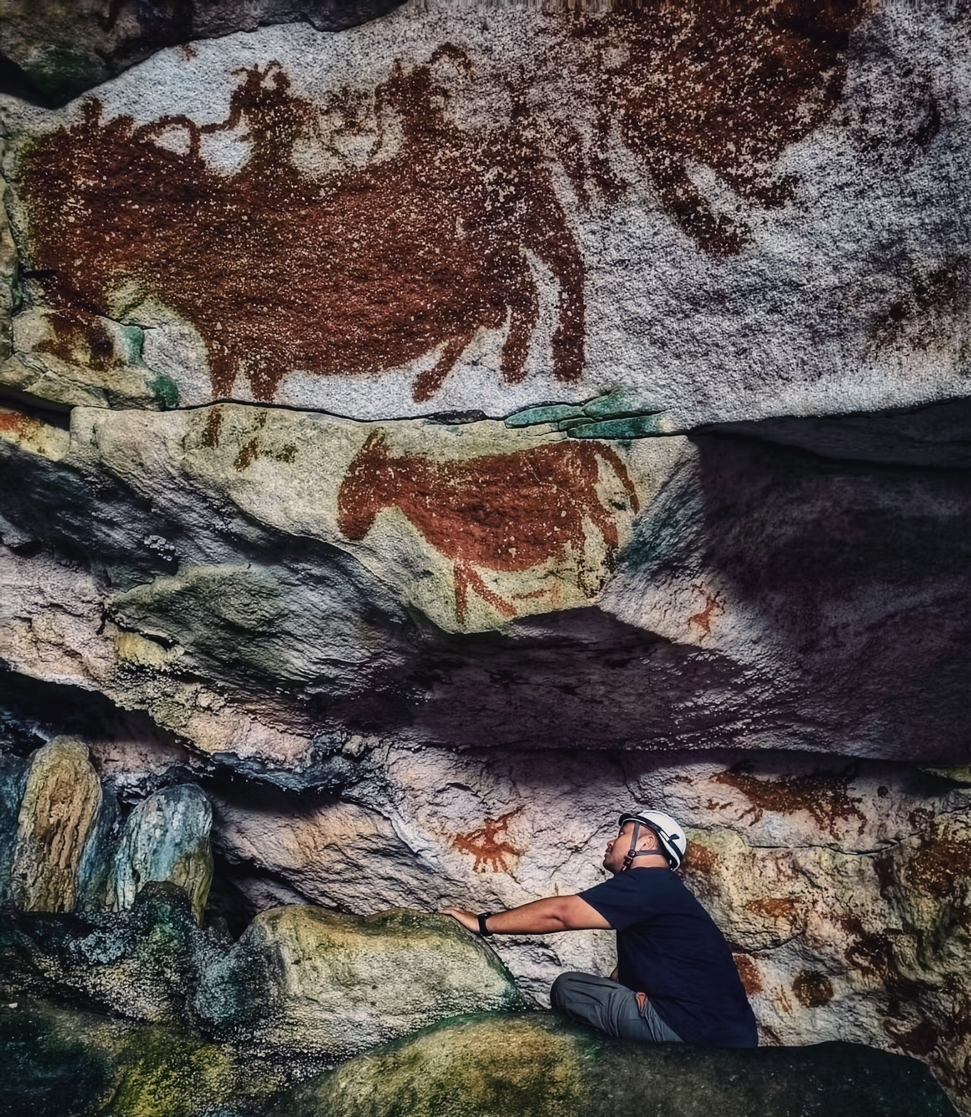 Shinatria Adhityatama working in the cave Sulawesi Indonesia