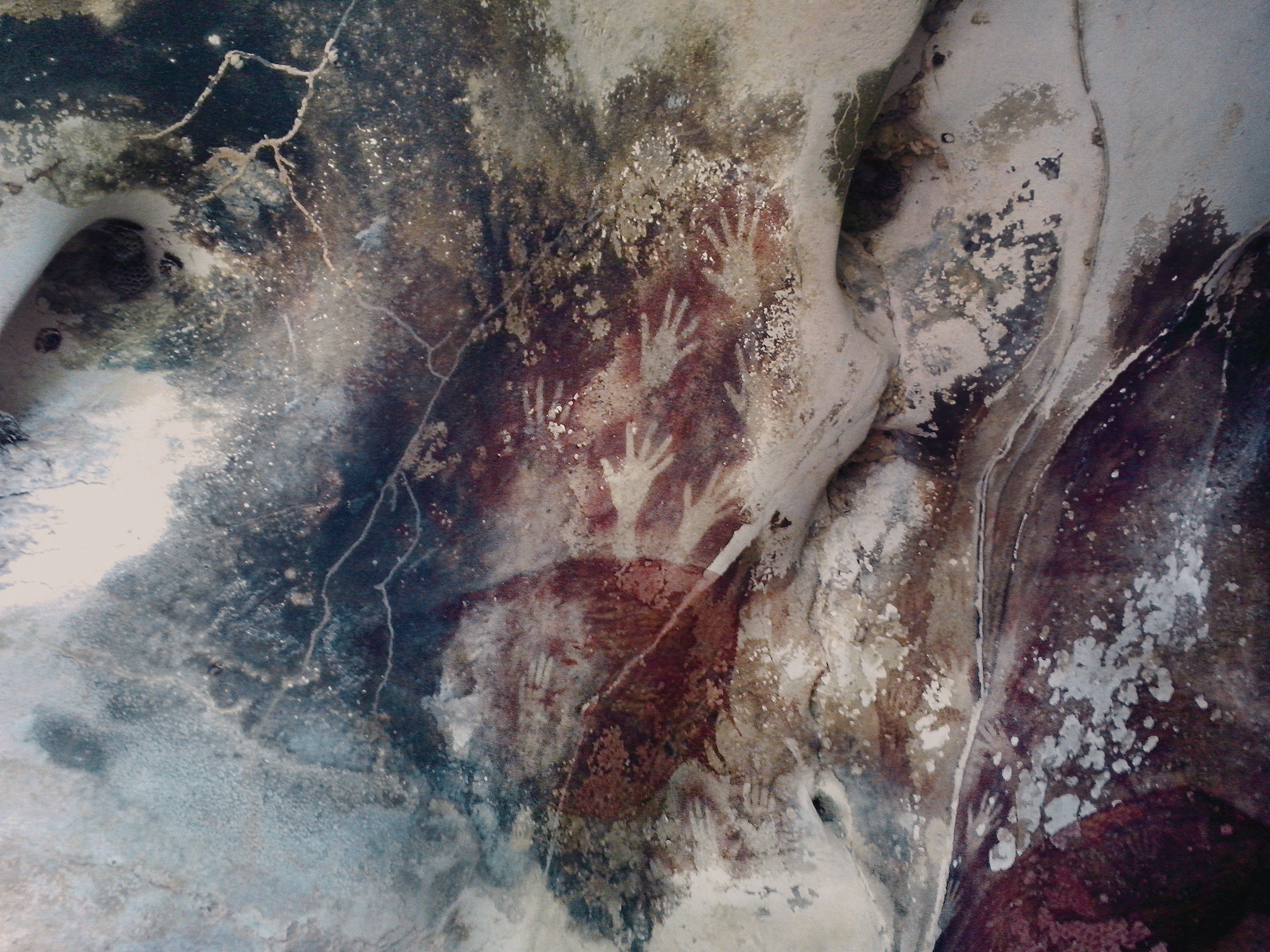 Hands depicted in paintings from the caves in the Maros-Pangkep karst Archaeology